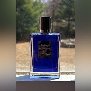 Kilian Deep Blue Glass Fragrance Bottle with Silver Cap this sells for $250